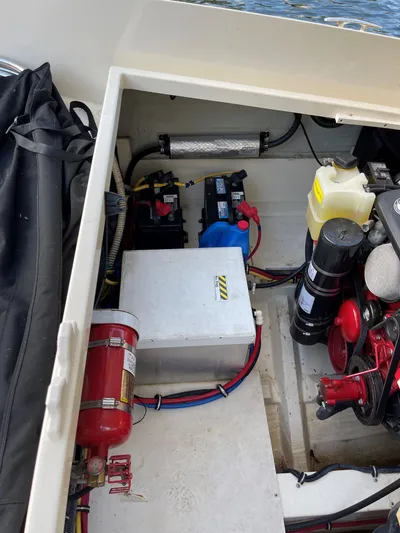 Grato Yacht Photos Pics Engine compartment of a 2015 Chris-Craft 32 Launch, showing mechanical components and wiring.