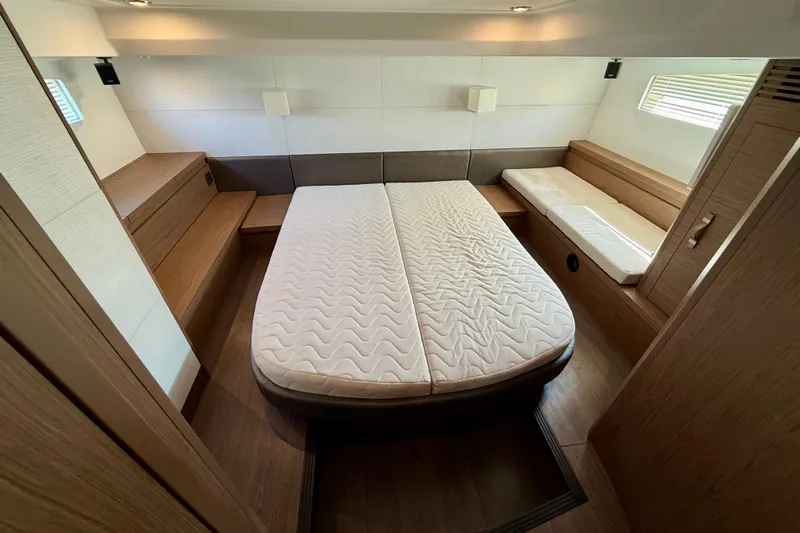New Trade-in- All Offers & Trades Welcome Yacht Photos Pics Luxurious cabin interior of 2019 Beneteau Gran Turismo 46 yacht, featuring a comfortable bed.