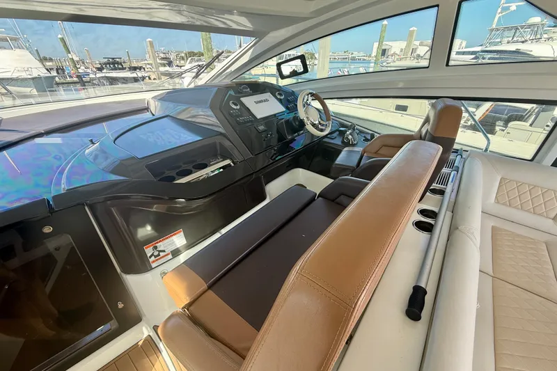 New Trade-in- All Offers & Trades Welcome Yacht Photos Pics 2019 Beneteau Gran Turismo 46 yacht interior with modern helm and luxurious seating.