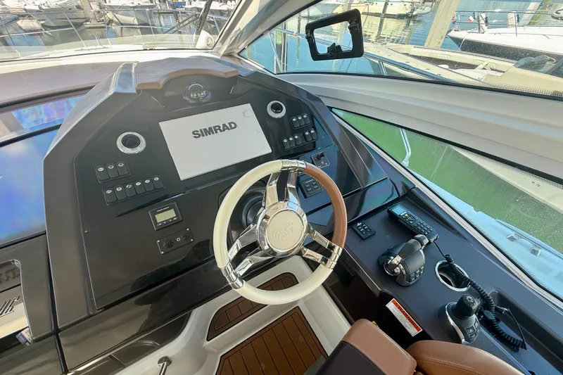 New Trade-in- All Offers & Trades Welcome Yacht Photos Pics 2019 Beneteau Gran Turismo 46 helm with Simrad display and modern controls.