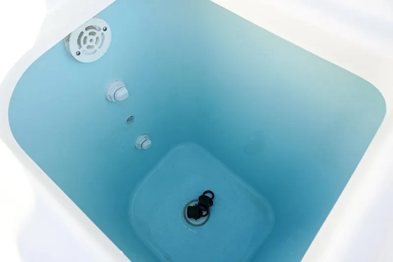 Lady Ann Name Reserved Yacht Photos Pics Livewell interior of 2018 Pursuit OS 355 Offshore boat, featuring drain and aerator.