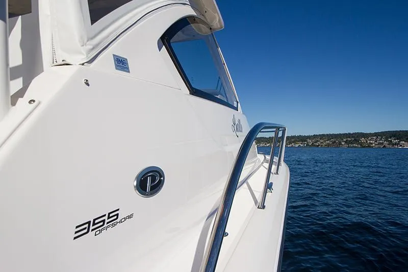 Lady Ann Name Reserved Yacht Photos Pics 2018 Pursuit OS 355 Offshore boat on calm blue water under clear sky.