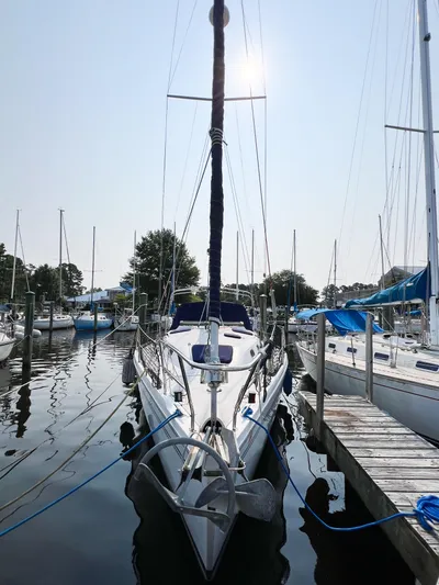 Cheers Yacht Photos Pics 2006 Catalina 350 sailboat docked at a marina on a sunny day.
