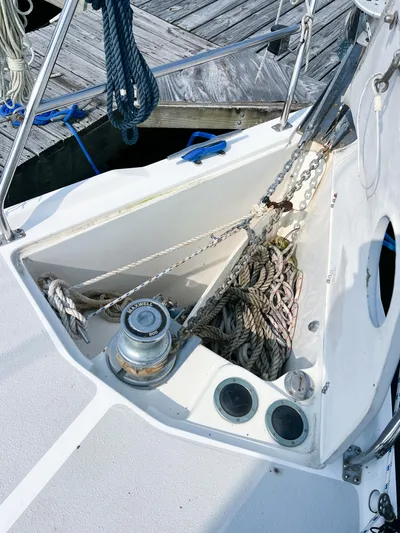 Cheers Yacht Photos Pics 2006 Catalina 350 sailboat deck with ropes and winch at dock.