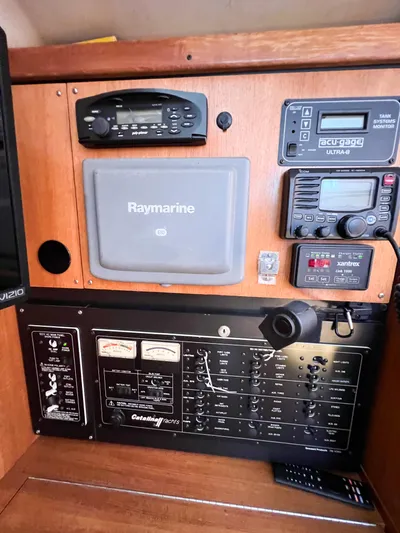 Cheers Yacht Photos Pics Control panel of a 2006 Catalina 350 sailboat with navigation and communication equipment.
