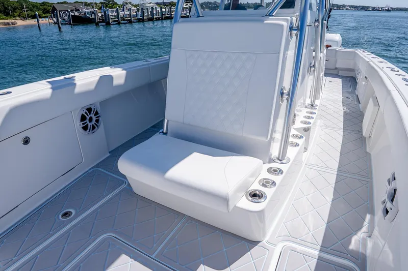 Fear N Money Yacht Photos Pics 2019 Concept 392 ProFish boat interior with white seating and rod holders.