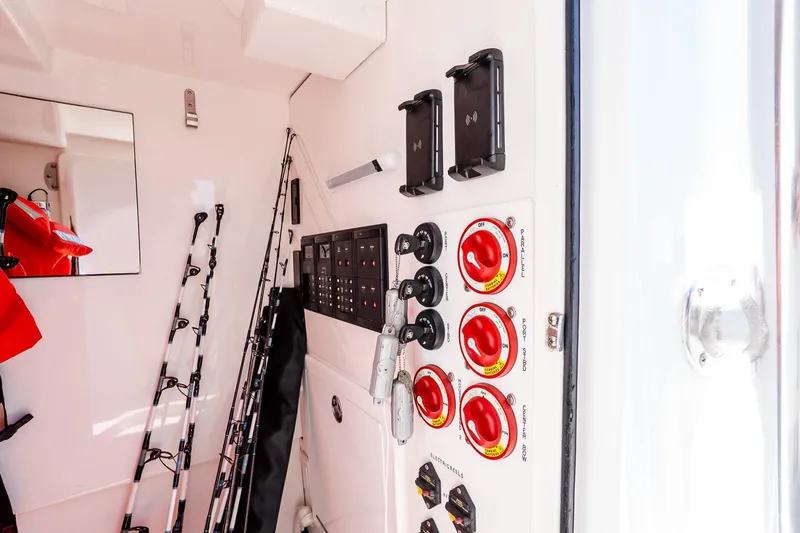 Fear N Money Yacht Photos Pics Interior of 2019 Concept 392 ProFish boat with fishing rods and control panel.