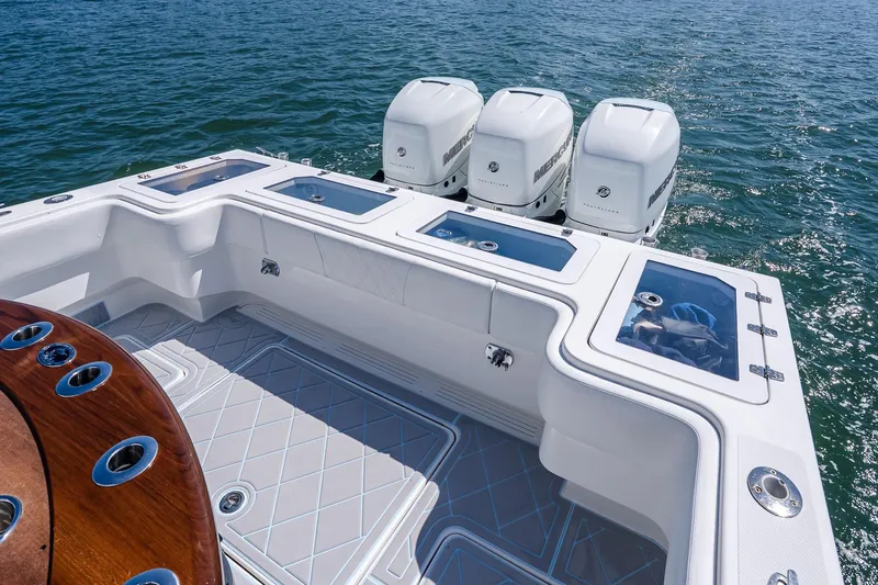 Fear N Money Yacht Photos Pics 2019 Concept 392 ProFish boat with triple Mercury outboard engines on the water.