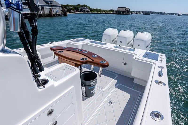 Fear N Money Yacht Photos Pics 2019 Concept 392 ProFish boat with fishing setup and triple outboard engines on the water.