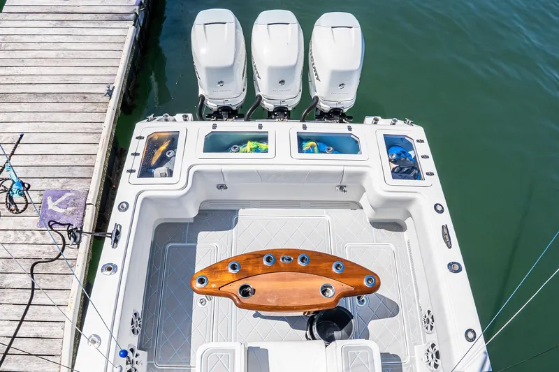 Fear N Money Yacht Photos Pics Overhead view of 2019 Concept 392 ProFish boat with triple engines and fishing setup.