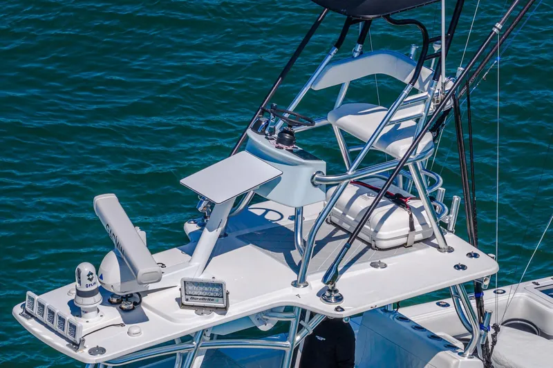 Fear N Money Yacht Photos Pics 2019 Concept 392 ProFish boat with advanced navigation equipment and seating, on blue water.