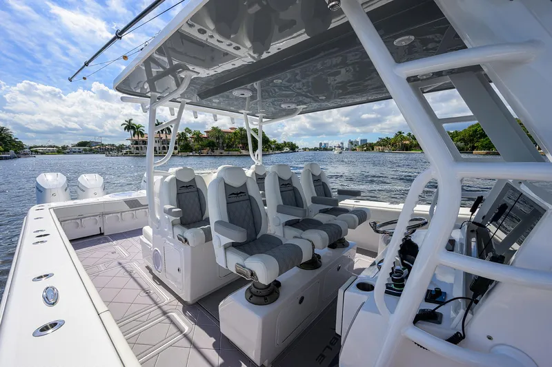 Argento II Yacht Photos Pics 2023 Invincible 46 Catamaran interior with luxury seating on a sunny day.