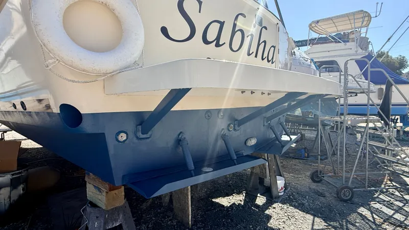 Sabiha Yacht Photos Pics 2004 Mainship 400 Trawler in dry dock, rear view.