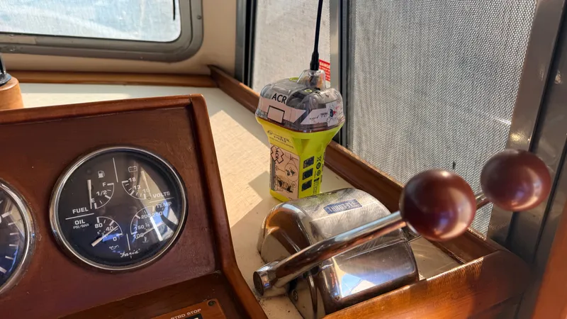 Sabiha Yacht Photos Pics 2004 Mainship 400 Trawler helm with gauges and controls.