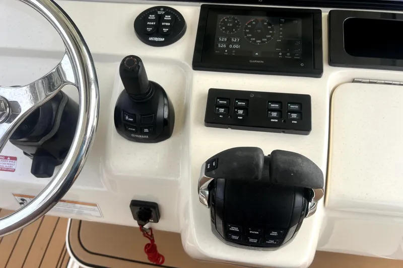 New Trade-in- All Offers & Trades Welcome Yacht Photos Pics 2018 Scout 350 LXF boat dashboard with Garmin display and Yamaha controls.