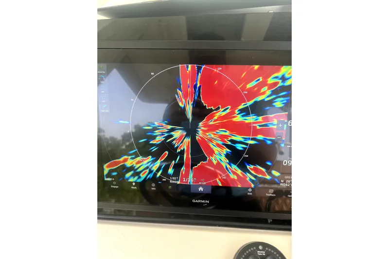 New Trade-in- All Offers & Trades Welcome Yacht Photos Pics Garmin radar display on 2018 Scout 350 LXF boat, showing colorful navigation data.