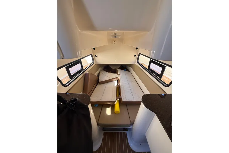 New Trade-in- All Offers & Trades Welcome Yacht Photos Pics 2018 Scout 350 LXF cabin interior with seating and windows.
