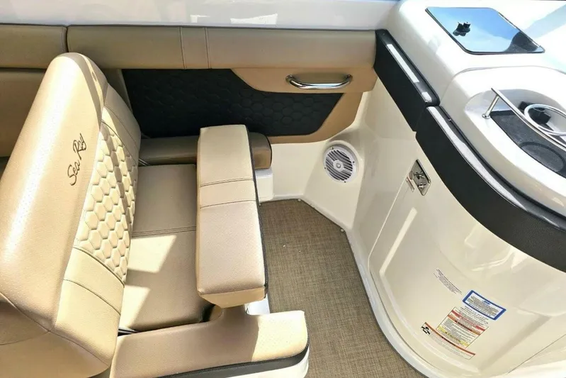Frisky Yacht Photos Pics 2018 Sea Ray SDX 290 Outboard interior with tan seating and modern design.