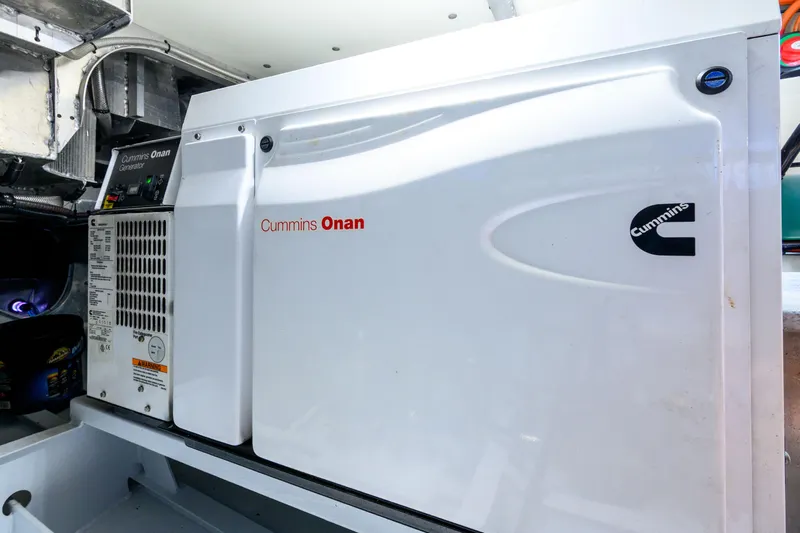 One Off Yacht Photos Pics Cummins Onan generator in 2019 Coral Coast 62 Power Catamaran engine room.