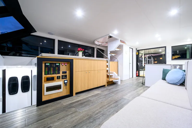 One Off Yacht Photos Pics Luxurious interior of 2019 Coral Coast 62 Power Catamaran with modern design and spacious layout.