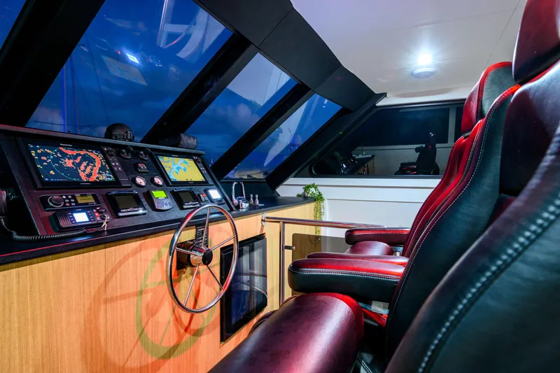 One Off Yacht Photos Pics Luxurious helm of 2019 Coral Coast 62 Power Catamaran with advanced navigation systems.