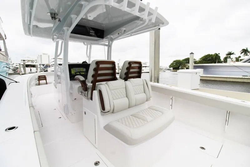  Yacht Photos Pics 2024 Jupiter 34 HFS boat interior with modern seating and sleek design.