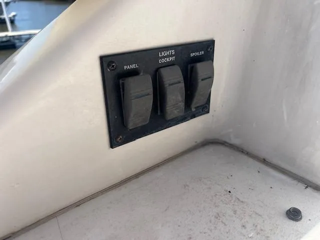 Papa's 7 II Yacht Photos Pics Control panel switches on a 1995 Sea Ray 440 Express Bridge yacht.