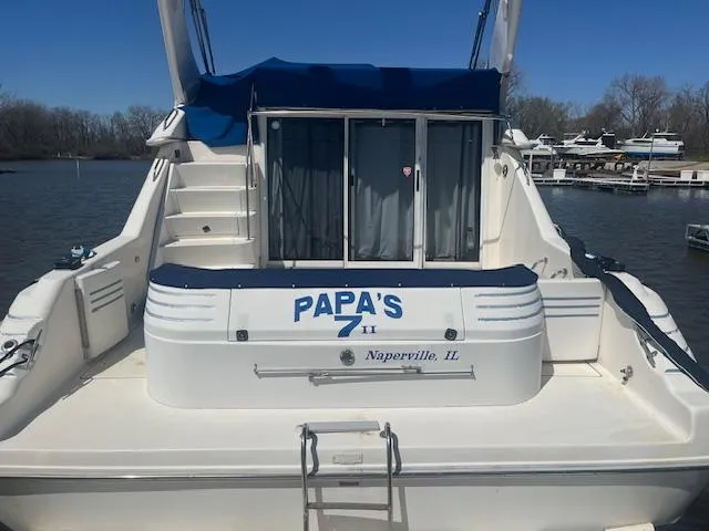 Papa's 7 II Yacht Photos Pics 1995 Sea Ray 440 Express Bridge boat docked, named "Papa's II," Naperville, IL.