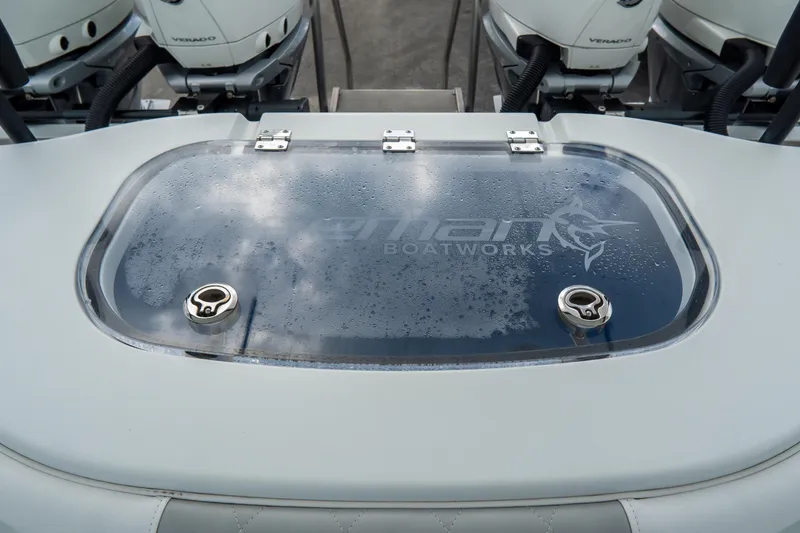  Yacht Photos Pics 2024 Freeman 38 boat livewell with Verado engines in background.