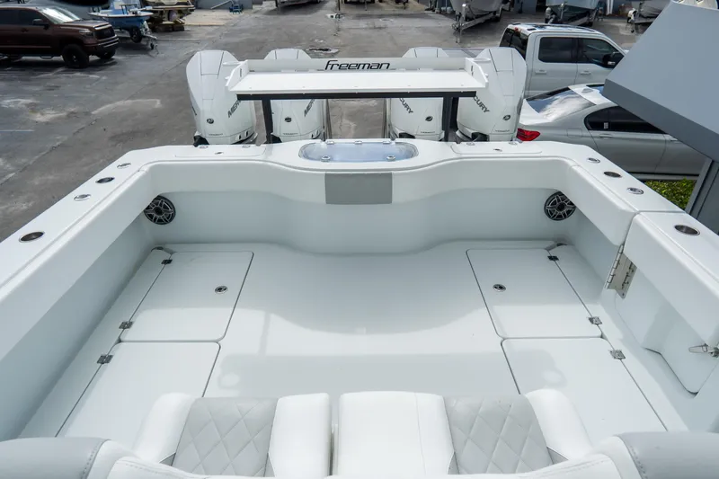  Yacht Photos Pics 2024 Freeman 38 boat deck with seating and storage compartments.