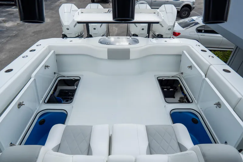  Yacht Photos Pics 2024 Freeman 38 boat interior with storage compartments and seating.