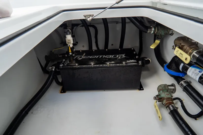  Yacht Photos Pics 2024 Freeman 38 boat engine compartment with visible wiring and components.