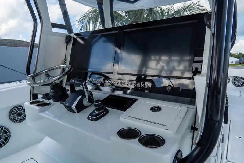  Yacht Photos Pics 2024 Freeman 38 boat dashboard with modern controls and dual screens.