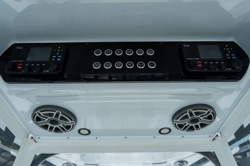  Yacht Photos Pics 2024 Freeman 38 boat dashboard with controls and speakers.