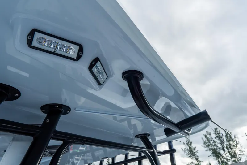  Yacht Photos Pics 2024 Freeman 38 boat roof with LED lights and sturdy black supports.