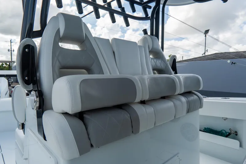  Yacht Photos Pics 2024 Freeman 38 boat seats, featuring luxurious gray and white upholstery.