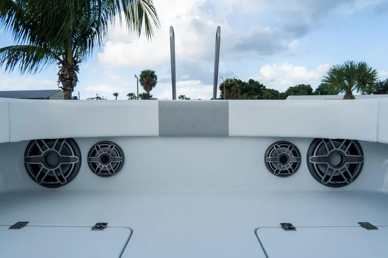  Yacht Photos Pics 2024 Freeman 38 boat interior with JL Audio speakers, palm trees in background.