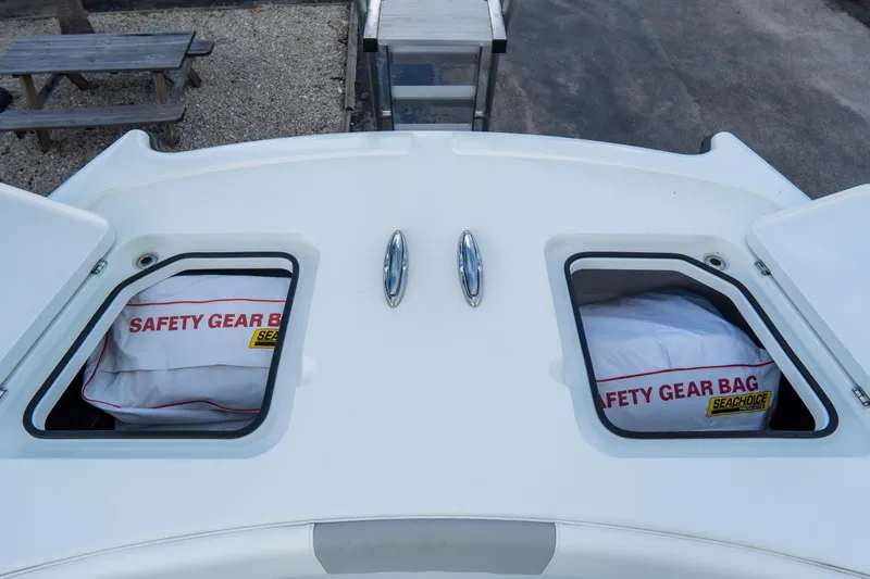  Yacht Photos Pics 2024 Freeman 38 boat with safety gear bags in storage compartments.