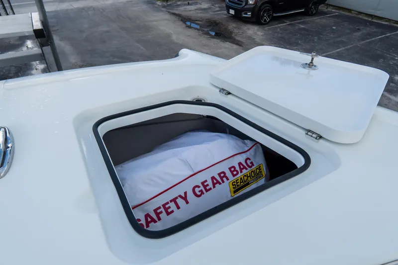  Yacht Photos Pics Open hatch on Freeman 38 boat, revealing safety gear bag, 2024 model.
