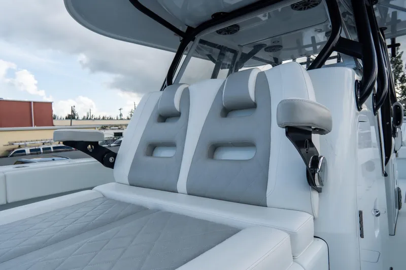  Yacht Photos Pics 2024 Freeman 38 boat interior with luxurious seating and modern design.