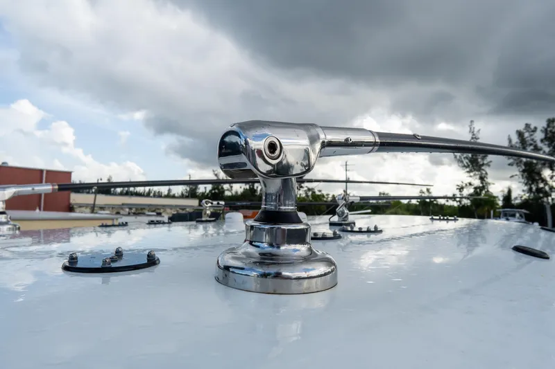  Yacht Photos Pics Chrome detail on Freeman 38 boat, 2024 model, under cloudy sky.