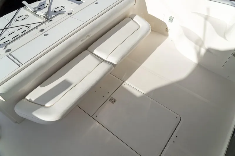  Yacht Photos Pics 2008 Sea Ray 58 Sedan Bridge deck with white seating and storage compartments.