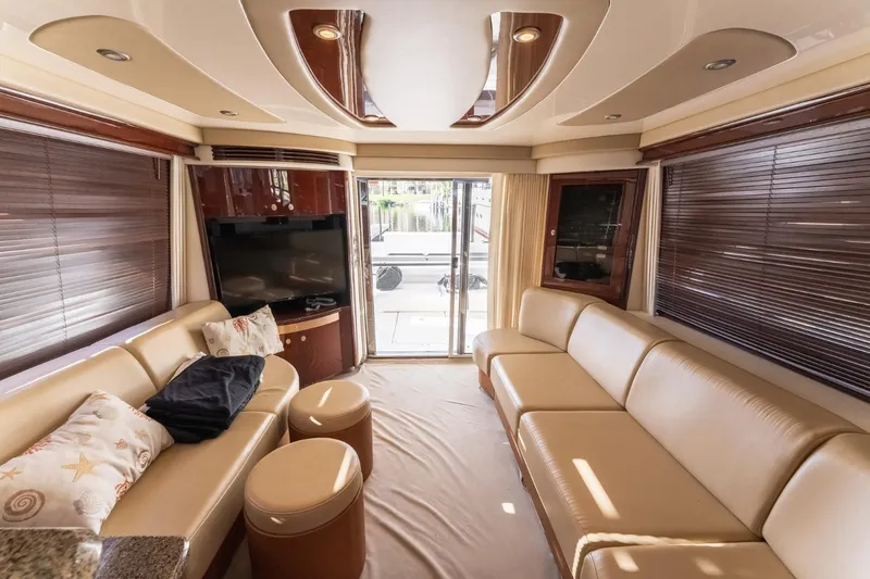  Yacht Photos Pics Luxurious interior of 2008 Sea Ray 58 Sedan Bridge yacht with leather seating and modern decor.