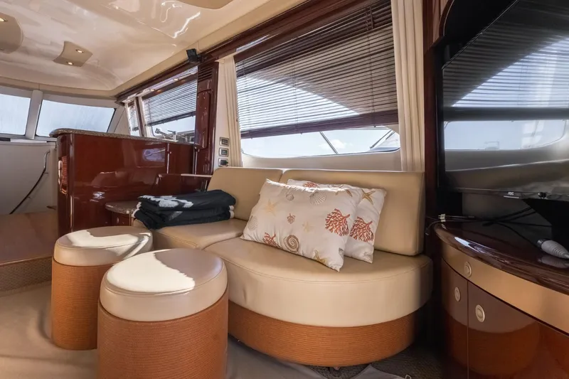  Yacht Photos Pics Luxurious interior of 2008 Sea Ray 58 Sedan Bridge yacht with elegant seating and decor.