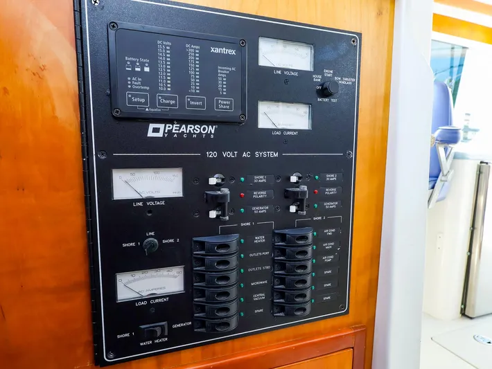  Yacht Photos Pics Electrical control panel on a 2004 True North 38 yacht, featuring voltage and current meters.