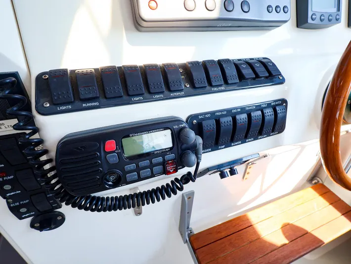  Yacht Photos Pics Control panel of a 2004 True North 38 boat with radio and switches.