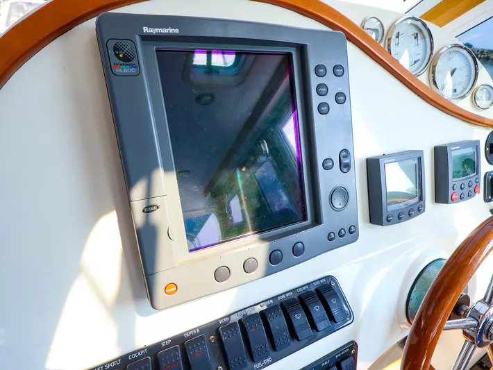  Yacht Photos Pics Boat dashboard with Raymarine navigation system, True North 38, 2004 model.