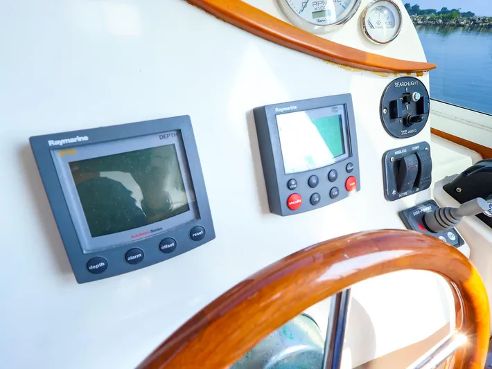 Yacht Photos Pics Boat dashboard with Raymarine displays and controls, True North 38, 2004 model.