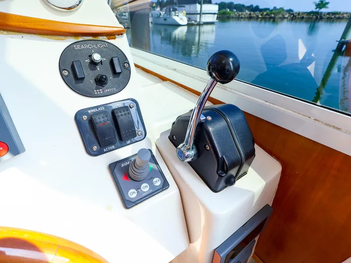  Yacht Photos Pics Control panel of a 2004 True North 38 boat with throttle and switches.