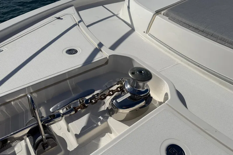  Yacht Photos Pics Riviera 50 Sports Motor Yacht 2021 deck with anchor winch and chain detail.